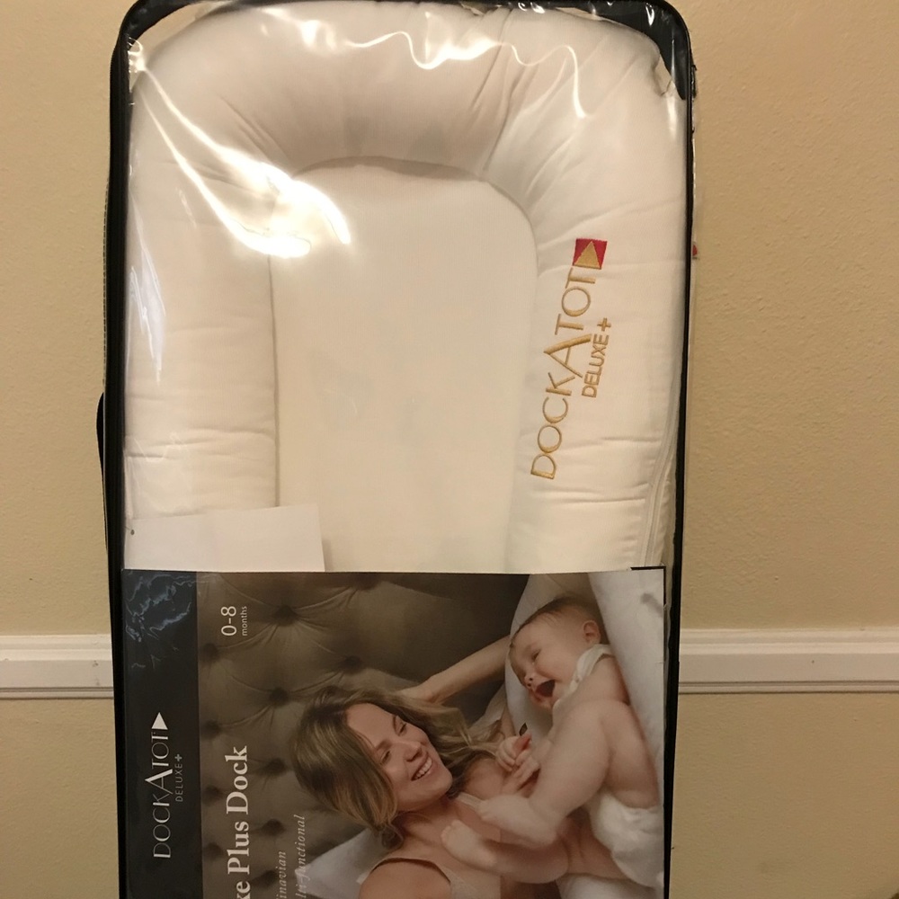Brand new never used dock a tot deluxe plus